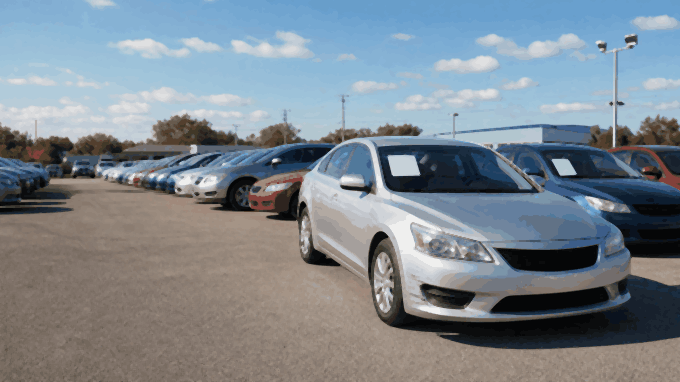Repaired car on a used car lot, where diminished value shows up in the price